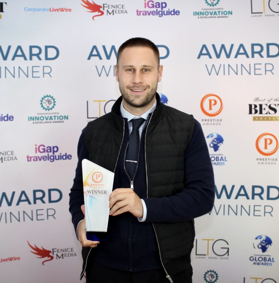 Josh Buffin collecting the award